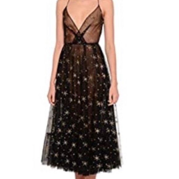 Beauty Garden Dresses & Skirts - Black dress covered in sparkling gold stars, size L